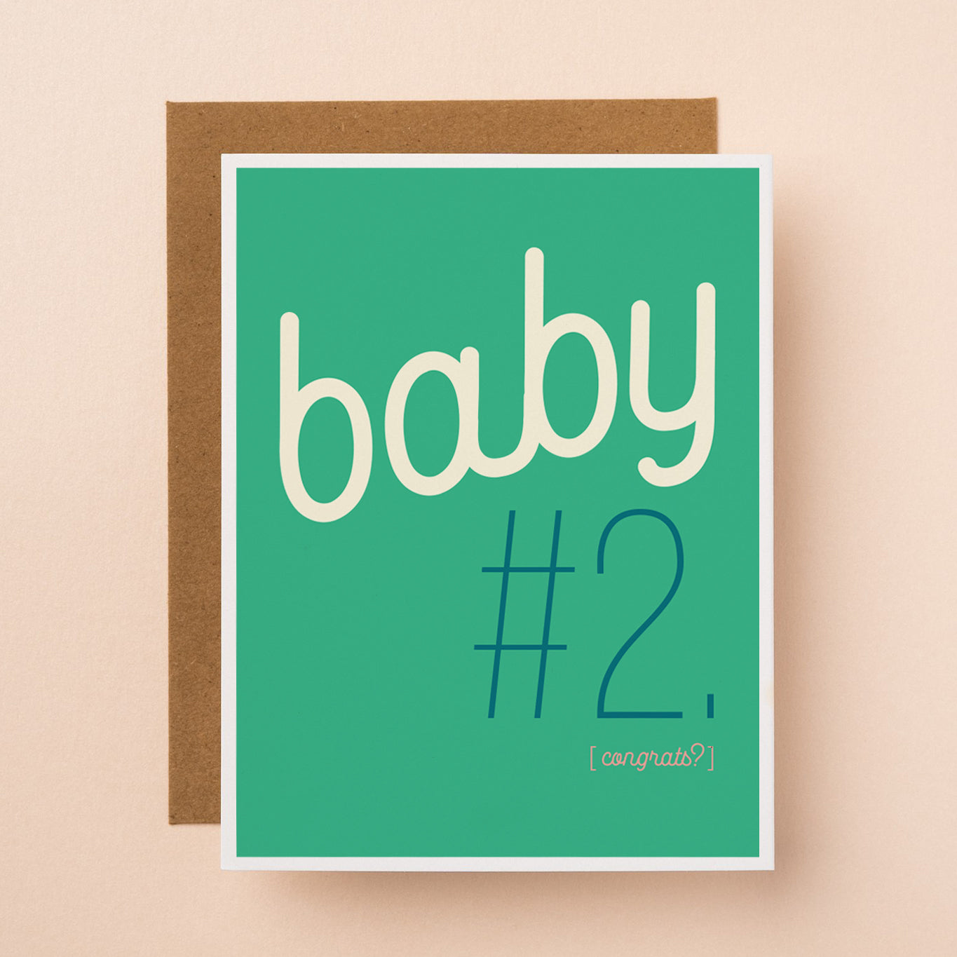 A funny & honest greeting card about parenthood and babies. The frontside reads "baby #2. (congrats?)
